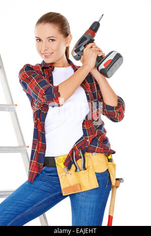 Competent young DIY woman Stock Photo