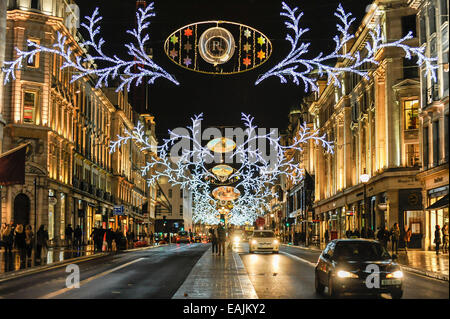 London, UK, 16 November, 2014. Switched on earlier in the day by the pop group, Take That, the Christmas lights in Regent Street are an annual tradition.  This year they are sponsored by the movie, 'Night at the Museum 2'. Credit:  Stephen Chung/Alamy Live News Stock Photo