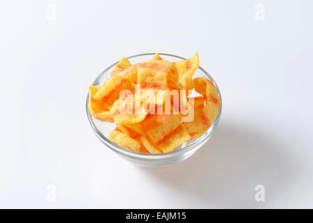 Bowl of bacon-flavored puffed wheat chips Stock Photo