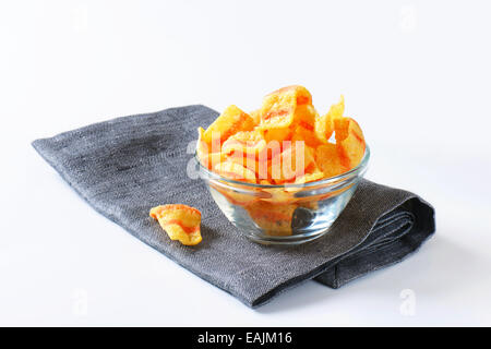 Bowl of bacon-flavored puffed wheat chips Stock Photo