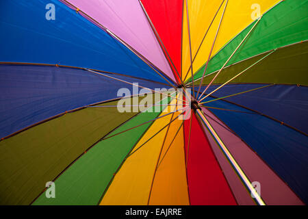 underside of a rainbow umbrella abstract colorful background Stock Photo