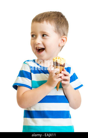 happy kid boy eating ice-cream in studio isolated Stock Photo