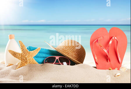 Summer concept with swimming accessories and blur sea on background Stock Photo