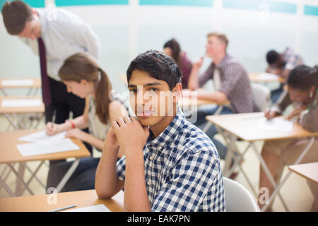 Portrait of confident student during his GCSE examination Stock Photo