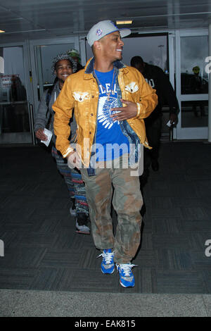 Rapper T.I. (real name Clifford Joseph Harris, Jr) arriving at John F. Kennedy (JFK) Airport  Featuring: T.I. Where: New York, New York, United States When: 15 May 2014 Stock Photo