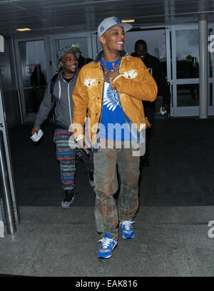 Rapper T.I. (real name Clifford Joseph Harris, Jr) arriving at John F. Kennedy (JFK) Airport  Featuring: T.I. Where: New York, New York, United States When: 15 May 2014 Stock Photo