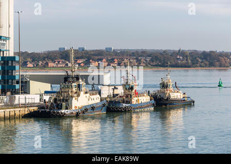 Tugs moored at the quayside, Southampton Docks, Port of Southampton, the Solent, Hampshire, UK Stock Photo