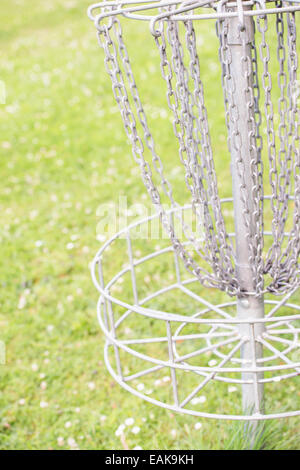 Target or goal for a frisbee in a park used for the game of disc golf Stock Photo