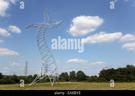 Dancing electricity pylon, Sculpture 'Zauberlehrling', German for 'Sorcerer’s Apprentice' created by Kuenstlergruppe Inges Stock Photo