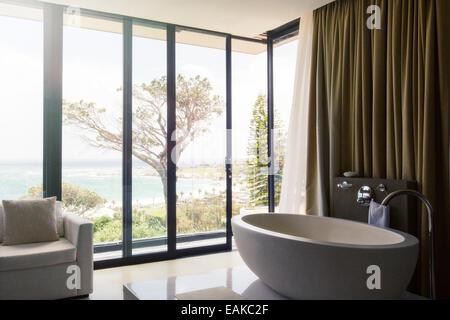 Luxurious bathroom with beautiful view on coast Stock Photo