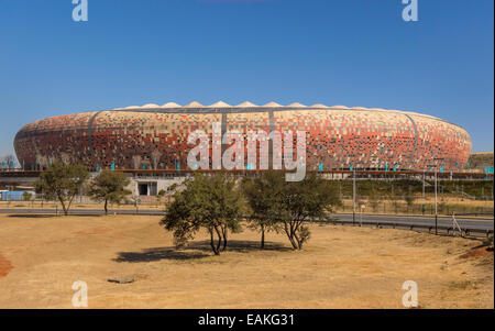 SOWETO, JOHANNESBURG, SOUTH AFRICA - FNB Stadium, aka Soccer City, a calabash-shaped football arena. Stock Photo
