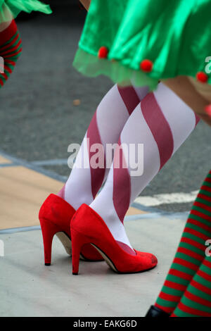 High-heeled shoes and stripy socks Stock Photo