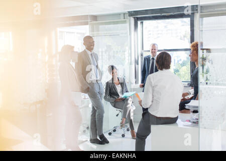 Smiling business people having meeting in modern in office Stock Photo