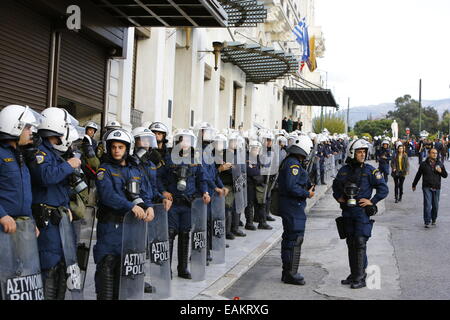 Angola Riot Police Riot police stand on a pavement as a group of people is searched nearby ...