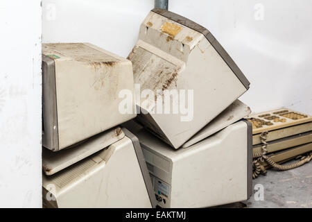 some old and obsolete pc and keyboards dumped in the street Stock Photo