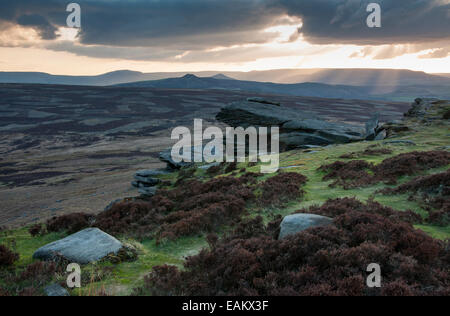 Sunbeams over the hills near Stanage Edge in the Peak District, Derbyshire. View over moorland landscape. Stock Photo