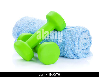 Two green dumbells and towel. Isolated on white background Stock Photo