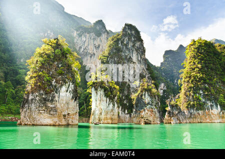 Travel island and green lake at Ratchaprapha Dam in Khao Sok National Park, Surat Thani Province, Thailand ( Guilin of Thailand  Stock Photo