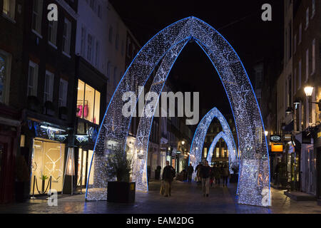 Christmas lights in South Molton Street at night, London, UK Stock Photo