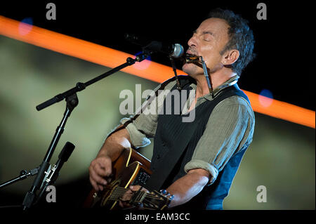 Rock superstar entertainer Bruce Springsteen plays harmonica and guitar during the Concert for Valor November 11, 2014 in Washington, D.C. Stock Photo