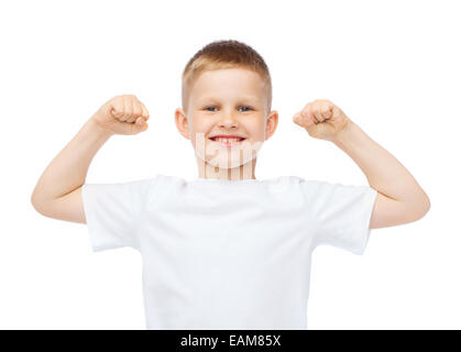 little boy in blank white t-shirt showing muscles Stock Photo