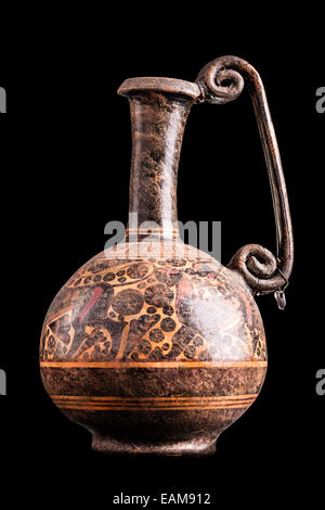 Ancient greek vase isolated over a black background Stock Photo