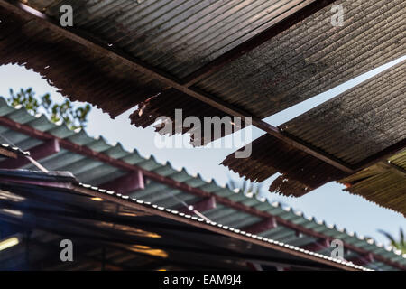 a shack ceiling made of rusty and corroded metal sheet Stock Photo