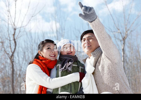 A family of three in the outdoor outing Stock Photo