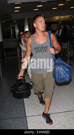 Alanis Morissette and her husband Mario “Souleye” Treadway arrive at
