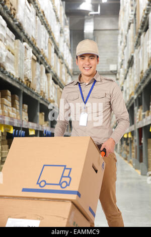 Eastern middle-aged logistics personnel in the work Stock Photo