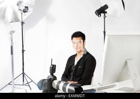 Fashion handsome young photographers Stock Photo