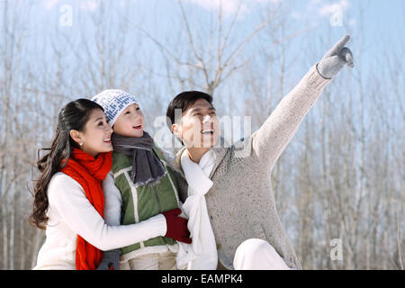 A family of three in the outdoor outing Stock Photo
