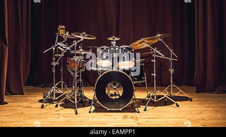 Modern drum set on stage prepared for playing. Stock Photo