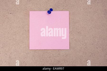 note paper with push pins on table Stock Photo