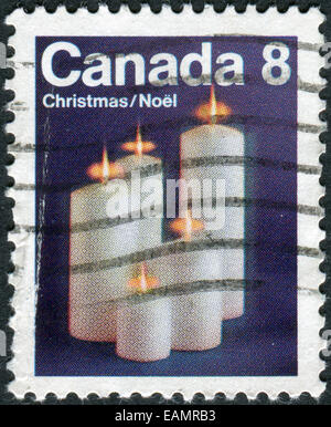 CANADA - CIRCA 1972: Postage stamp printed in Canada, Christmas issue, shows Christmas candles, circa 1972 Stock Photo