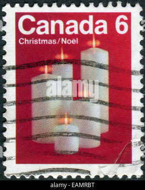 CANADA - CIRCA 1972: Postage stamp printed in Canada, Christmas issue, shows Christmas candles, circa 1972 Stock Photo