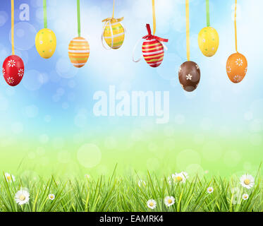 Happy Easter eggs in meadow Stock Photo