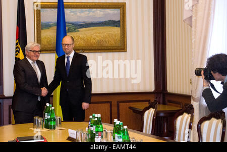 Kiev, Ukraine. 18th Nov, 2014. Foreign Minister Frank-Walter Steinmeier (L) is greeted by Prime Minister of Ukraine Arseni Jazenjuk in Kiev, Ukraine, 18 November 2014. The talks focused on how to give the troubled ceasefire in Eastern Ukraine more validity. Steinmeier will then travel to Moscow, his first visit to the Russian capital since the annexation of Crimea. Photo: CHRISTOPH SATOR/dpa/Alamy Live News Stock Photo