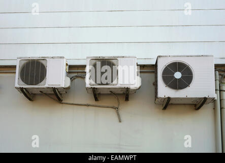 Air conditioning units on side of building. Stock Photo