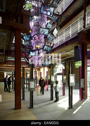 Visitors indoors the Manchester Science and Industry Museum, MOSI, housed in the former Liverpool Road Railway station, Manchester, UK Stock Photo