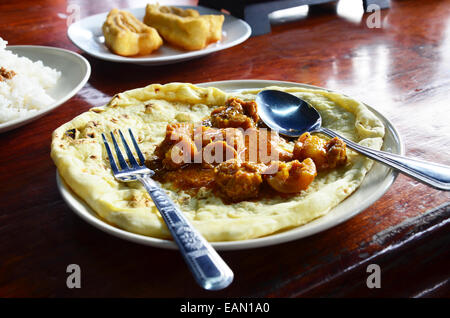 Roti Mataba with Chicken massaman Curry Stock Photo