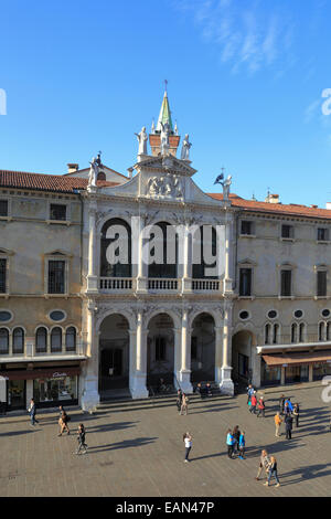 Tourists in the Palazzo del Monte di Pieta outside the Church of San Vincenzo in Vicenza, Italy, Veneto. Stock Photo