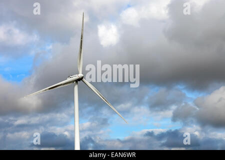 Wind turbine generator on top of a hill for the production of clean and renewable energy in Terras Altas de Fafe, Portugal Stock Photo