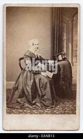 Victorian carte-de-visite, portrait of a woman.  Taken by an unknown photographer, circa 1865 Stock Photo