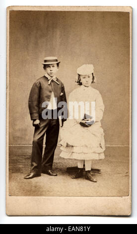 Victorian portrait of two young children.  Taken in the studio of Clarendon & Co, Kingstown (Dun Laoghaire) Ireland  circa 1870 Stock Photo