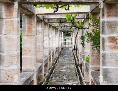 Attard, Malta. A stone pergola in the gardens of Villa Bologna, a fine 18c Maltese house in the Baroque style Stock Photo