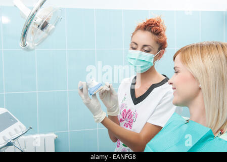 Work of dentist is not so easy Stock Photo