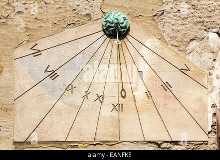 Sundial clock on old house wall in Tkalciceva street in Zagreb, Croatia Stock Photo