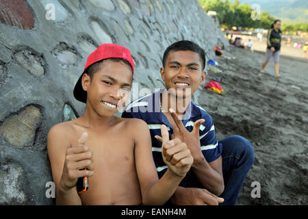 Portrait of teenage boys on beach in Ende, Flores Island Stock Photo