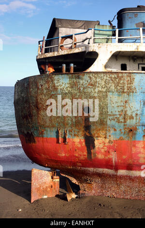 Stern of beached shipwreck in Flores Island, Indonesia Stock Photo